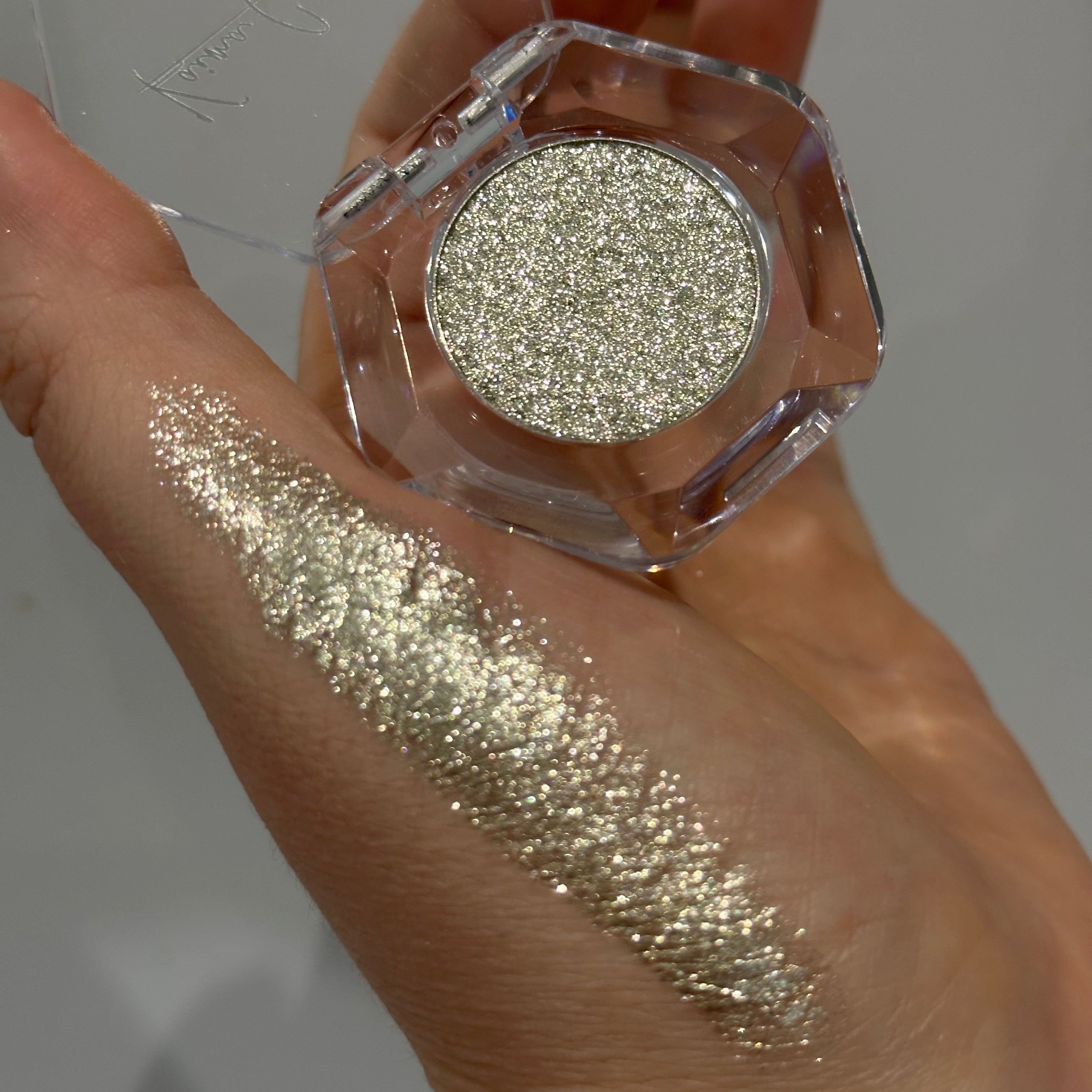 Silver pressed glitter eyeshadow swatch