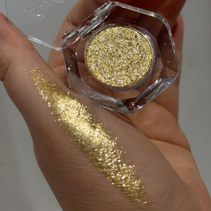 Gold glitter eyeshadow swatch